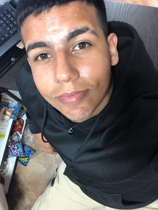 Young man photographed indoors in Juan Griego, Venezuela