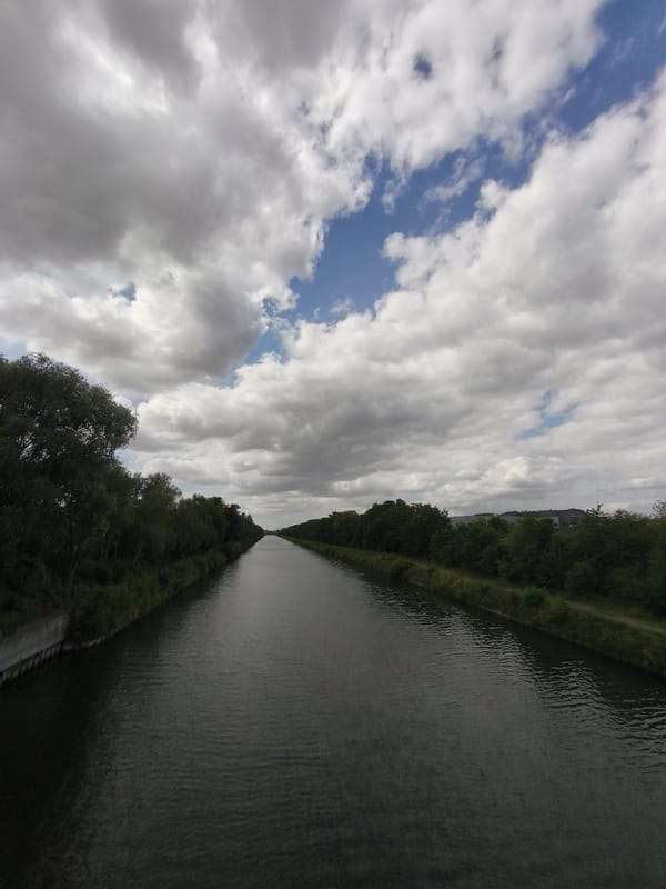 Canal views along the waterway in Dourges, France