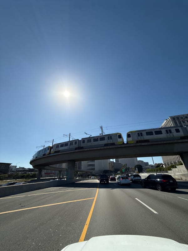 Metro Rail train operates through downtown Los Angeles evening