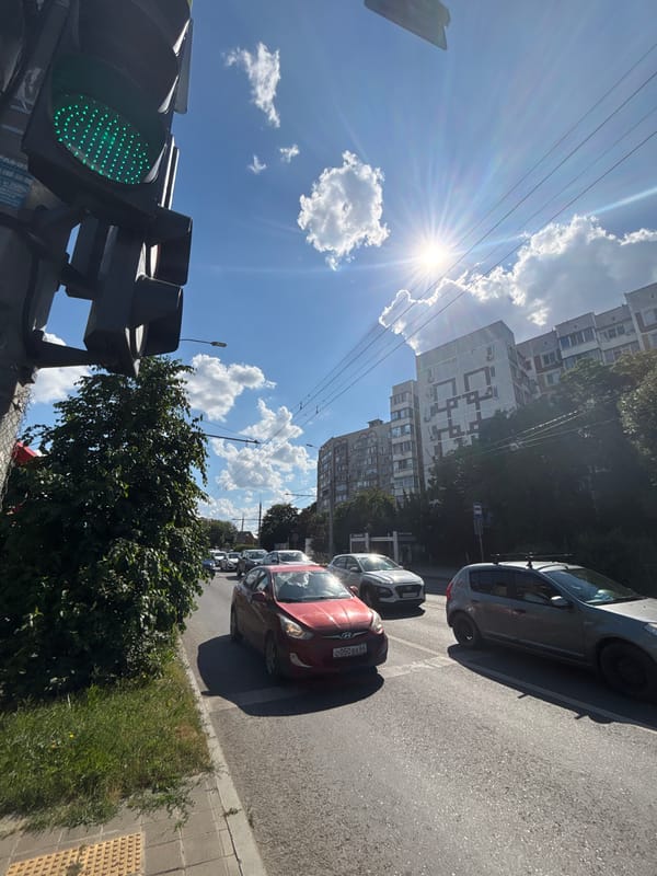 Midday street life on a residential block in Krasnodar
