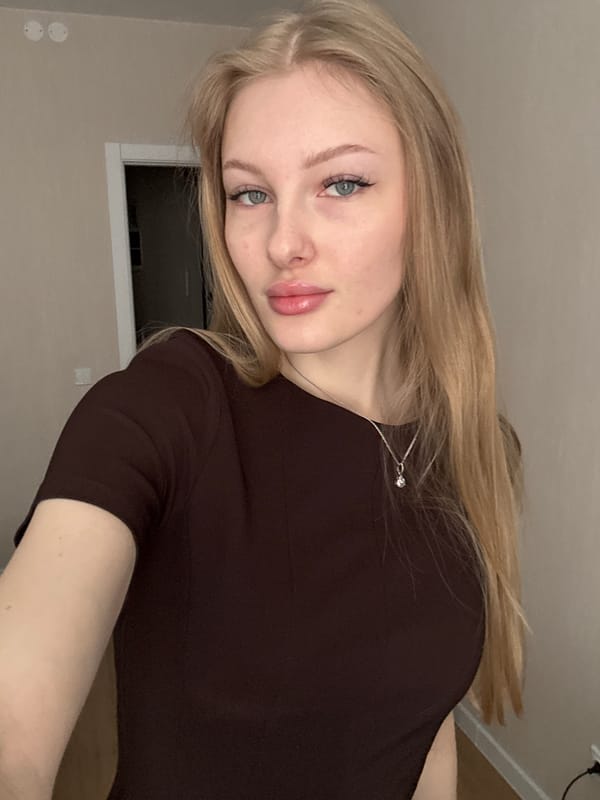 Young woman takes multiple selfies in Perm, Russia