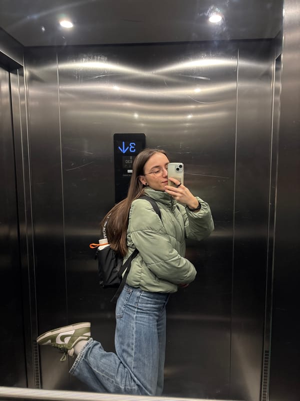 Woman Takes Elevator Selfie in Copenhagen Morning
