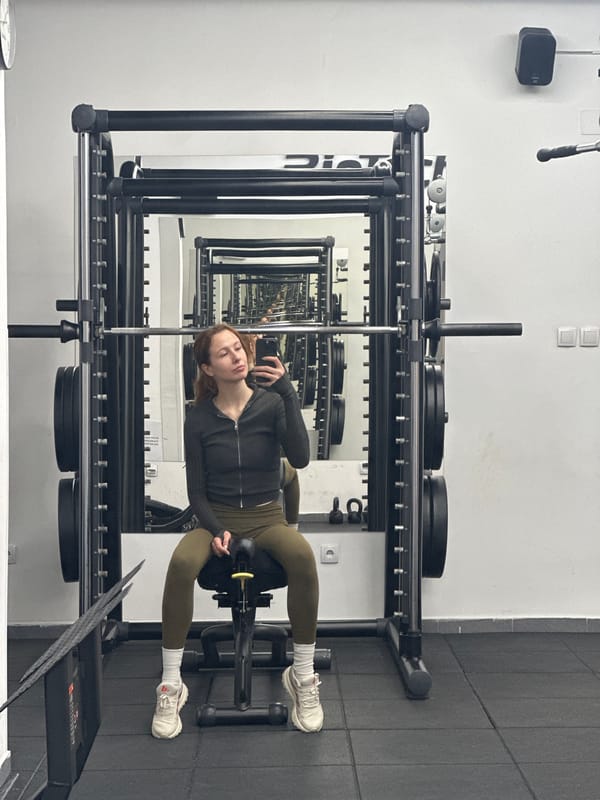 Person exercises on leg machine at Novi Sad gym