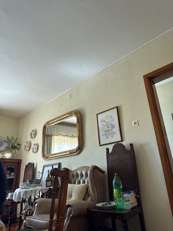 Family gathering in garden setting with spring flowers