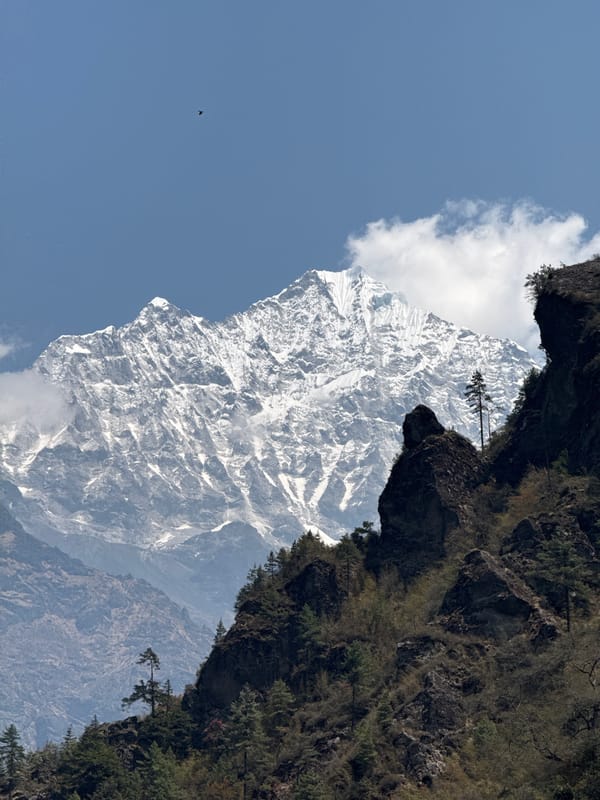 Snow-capped mountain peak documented in Nepal high-altitude landscape
