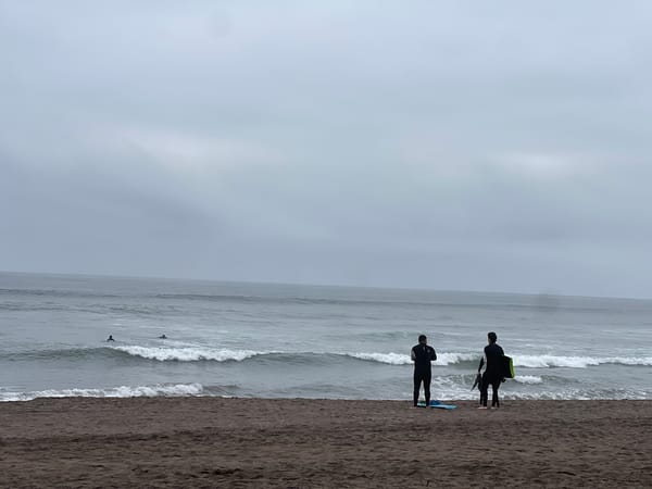Surf session and beachside café life on Arica's coast