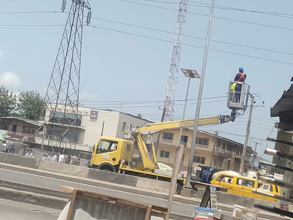 Utility maintenance work documented in Shangisha, Nigeria neighborhood