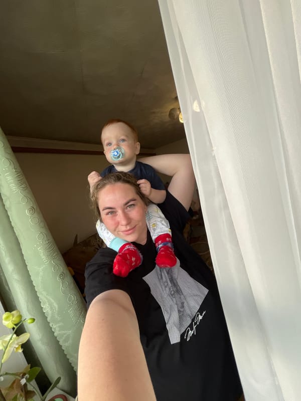 Woman and toddler share quiet moment in Сосново home