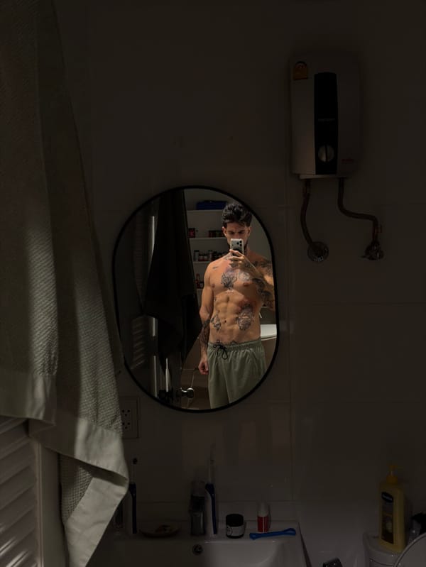 Man takes mirror selfies in Bangkok interior