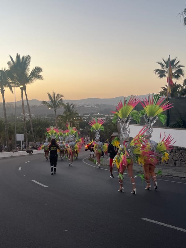 Carnival parade features costumed participants across Gran Canaria towns