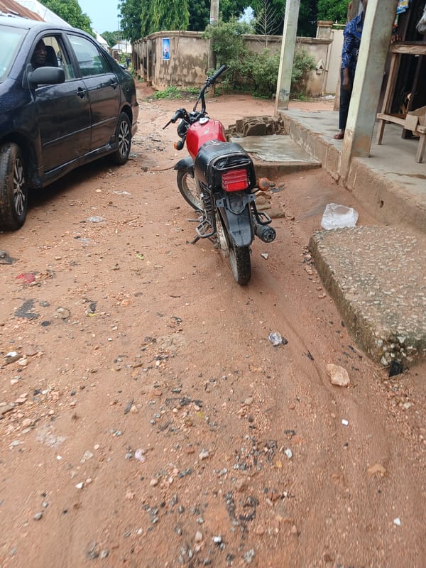 Inside a Jalingo tailor's workshop after the rain