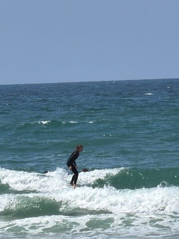 Group practices outdoor yoga in Tel Aviv park