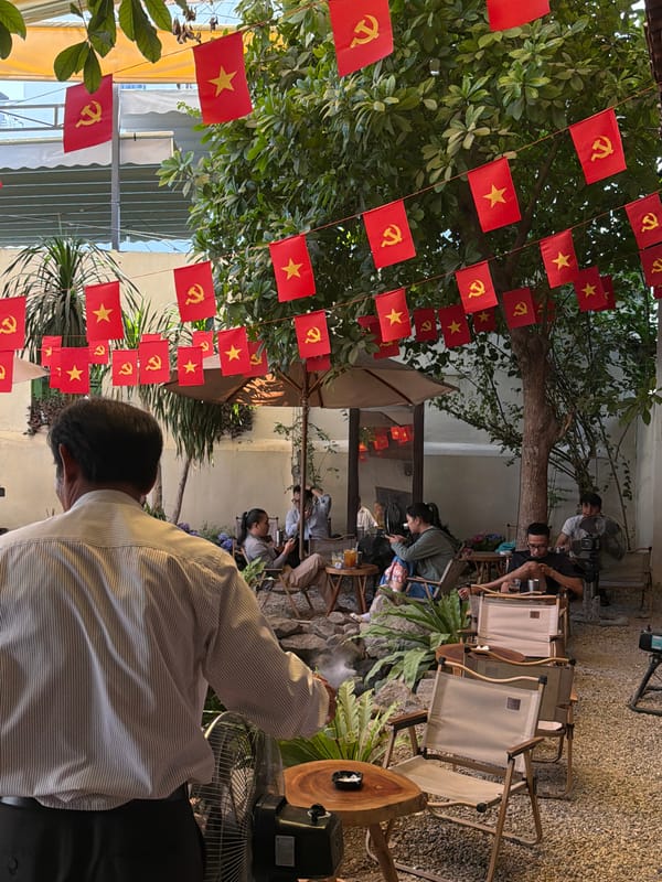 Flag-decorated Nha Trang streets during an early morning in June
