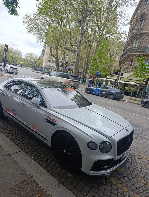 Racing-stickered Bentley spotted on Paris cobblestones near Eiffel Tower