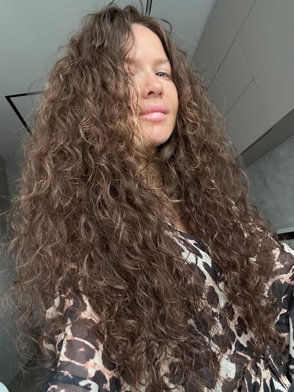 Close-up portrait with curly hair and leopard print, Khimki