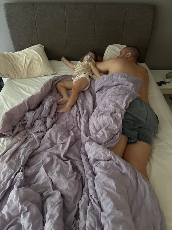 Peaceful nap time under a light purple duvet in Choeng Thale