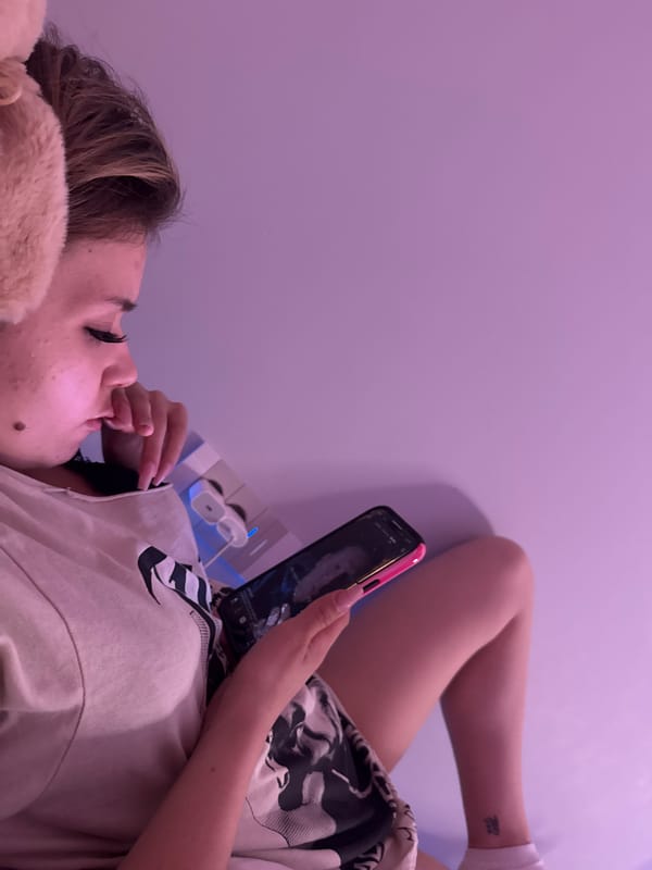 Young woman takes multiple selfies in bedroom in Rezbartsi