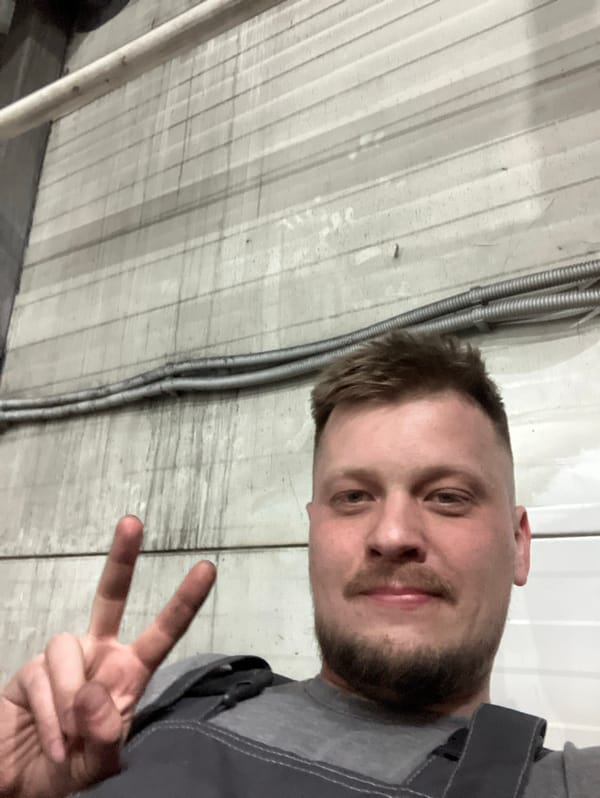 Worker takes selfie with peace sign in Noviy facility