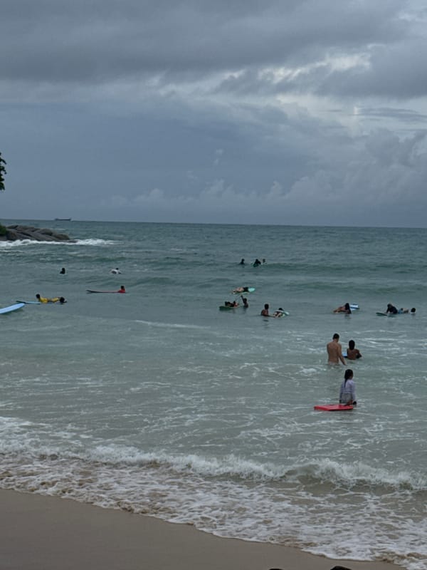 Karon Beach surf session under cloudy skies