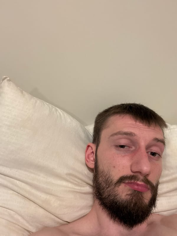 Man resting on pillow observed in Finnsnes, Norway