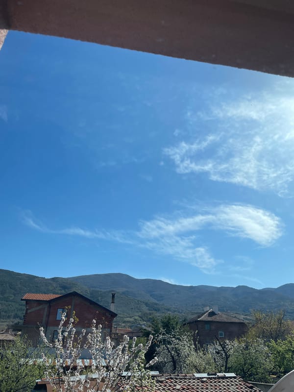 Car journey documented near Green Park Apartments, mountain landscape