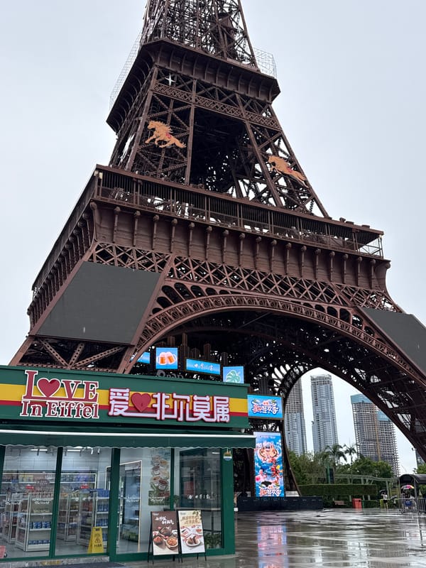 Replica Eiffel Tower and a NAVIAI humanoid robot in Nanshan District
