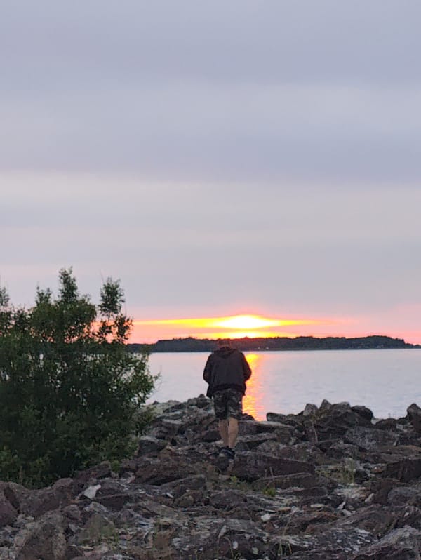 Sunset observer documents evening at Tallinn Port waterfront
