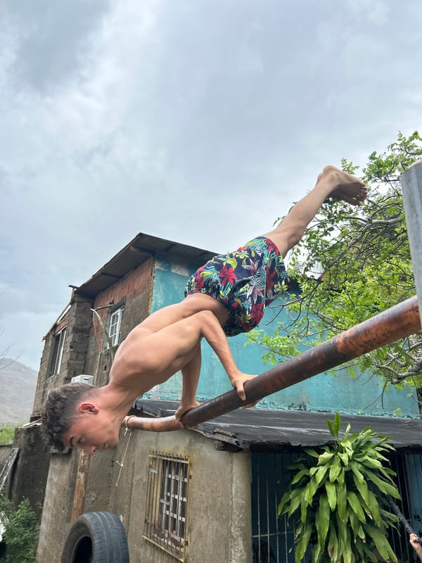 Young man climbs mango trees, exercises outdoors in Venezuelan community