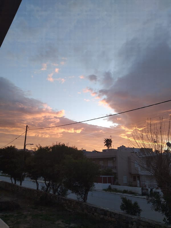 Dramatic orange-blue sunset captured in Καρδάμαινα, Greece