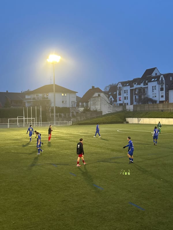 Soccer match played under lights in Bischheim, France