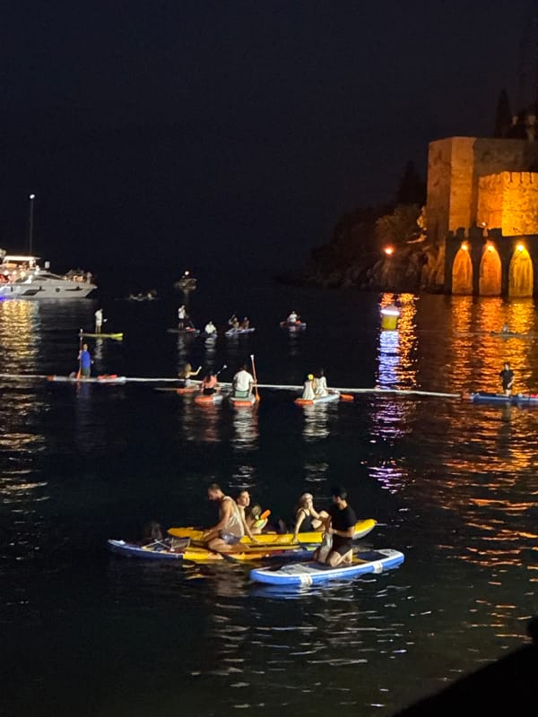 A lit-up evening on the water in Alanya's harbor