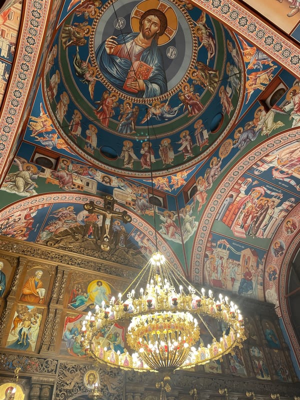 Orthodox church interior with ornate ceiling documented by witness