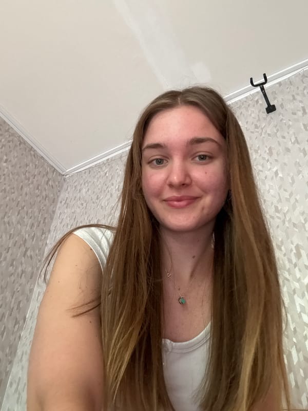 Woman documents selfie session with cat in Perm