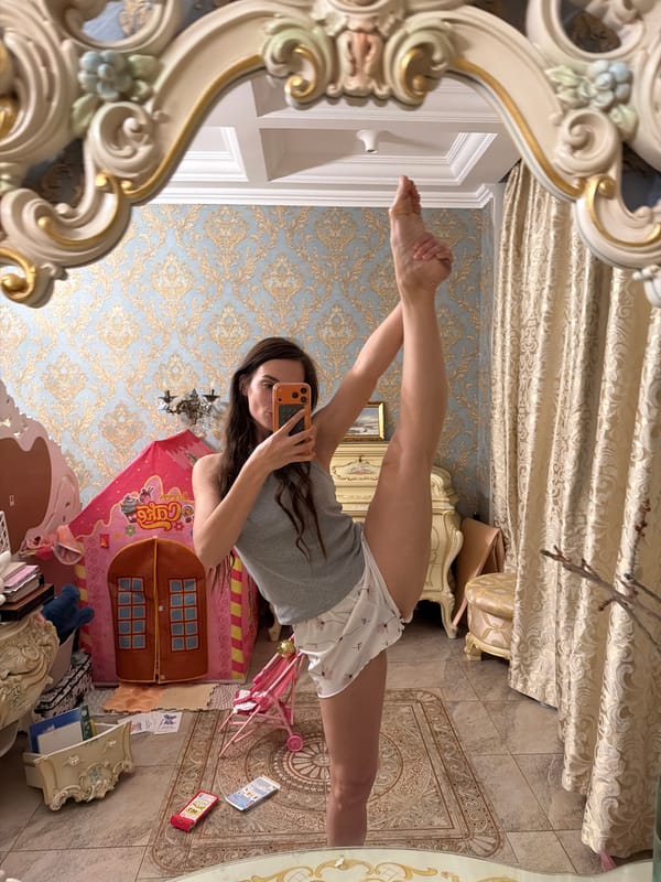Extreme split pose captured from two angles in Ufa