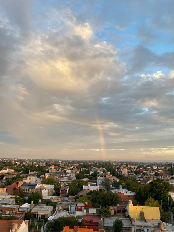 Golden sunset light illuminates residential Wilde, Argentina cityscape