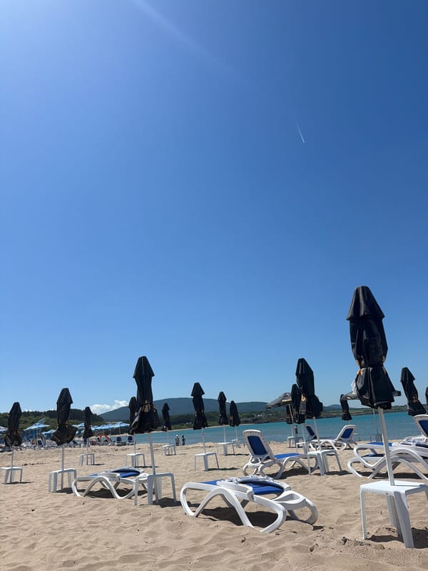 Empty beach umbrellas and loungers captured at Ahtopol Bulgaria