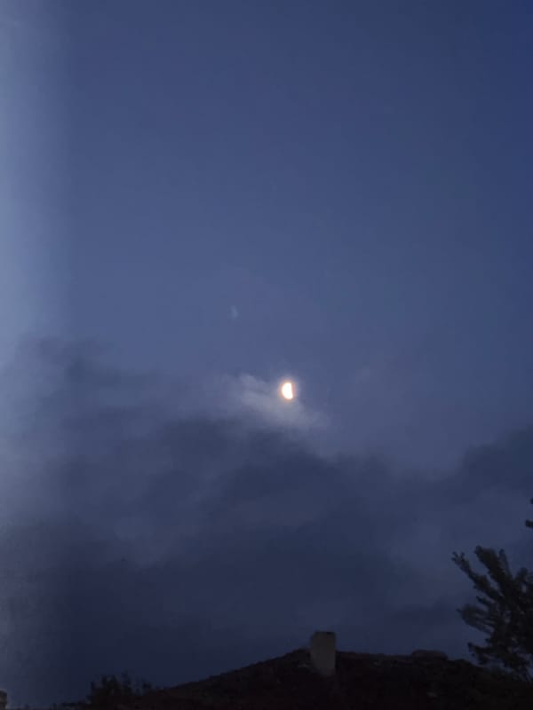 Late-night birthday party with drums, drinks, crescent moon sightings