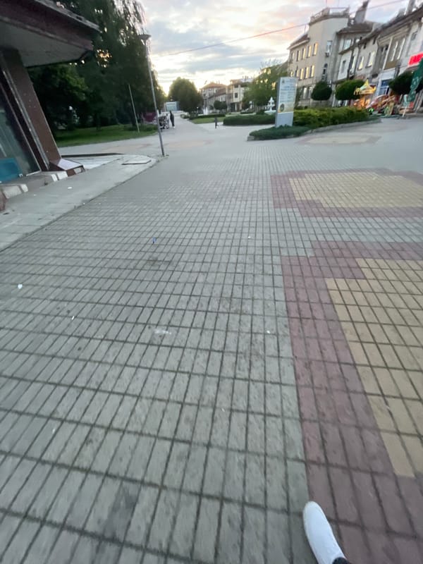 Evening walk documented through quiet Bulgarian town center