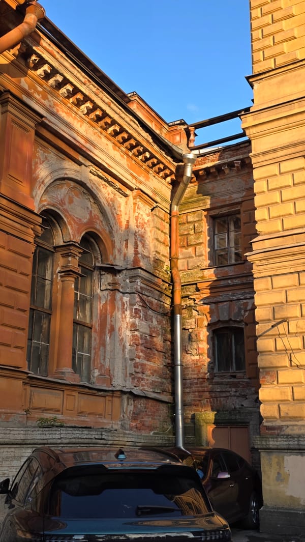 Anonymous witness documents Saint Petersburg architecture during afternoon walkabout