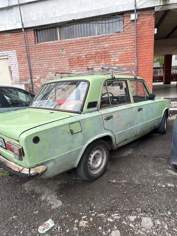 Faded green Lada sedan spotted parked in Burgas