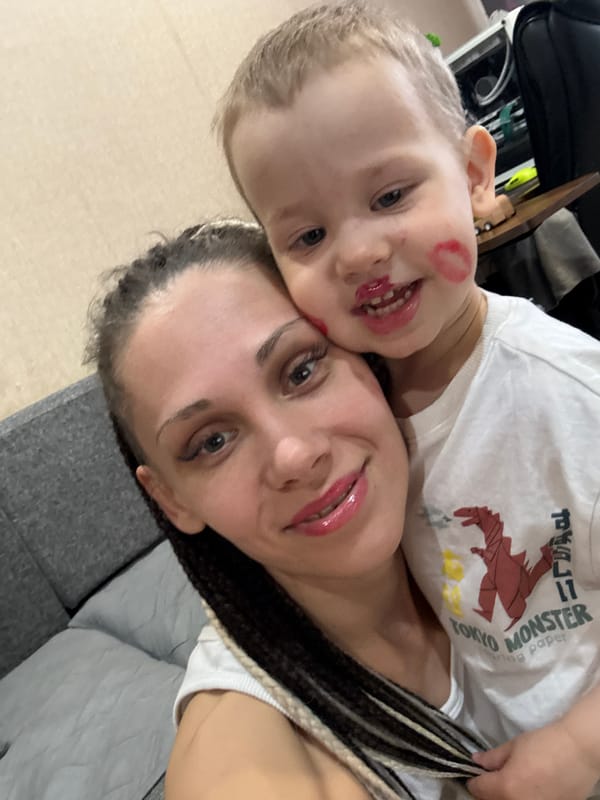 Playful lipstick moments shared between adults and children in Russia