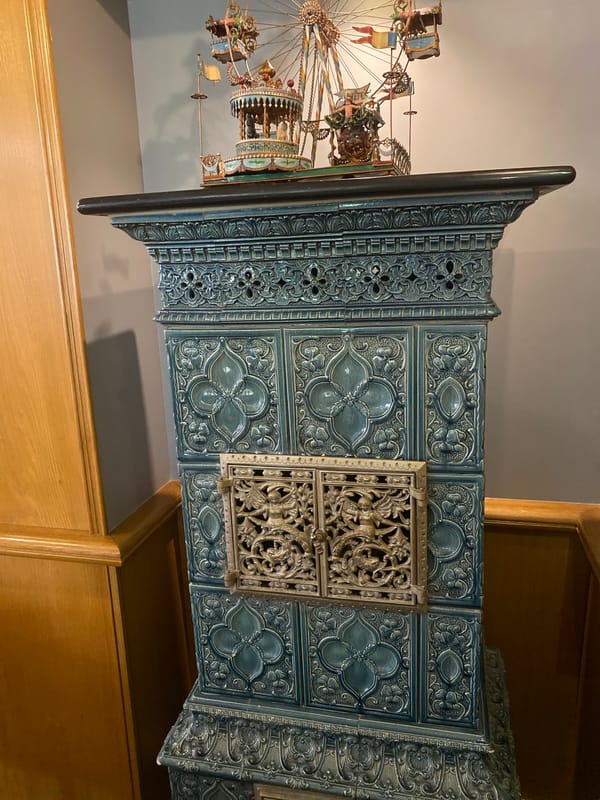 Antique tiled stove with carousel documented in Marlenheim