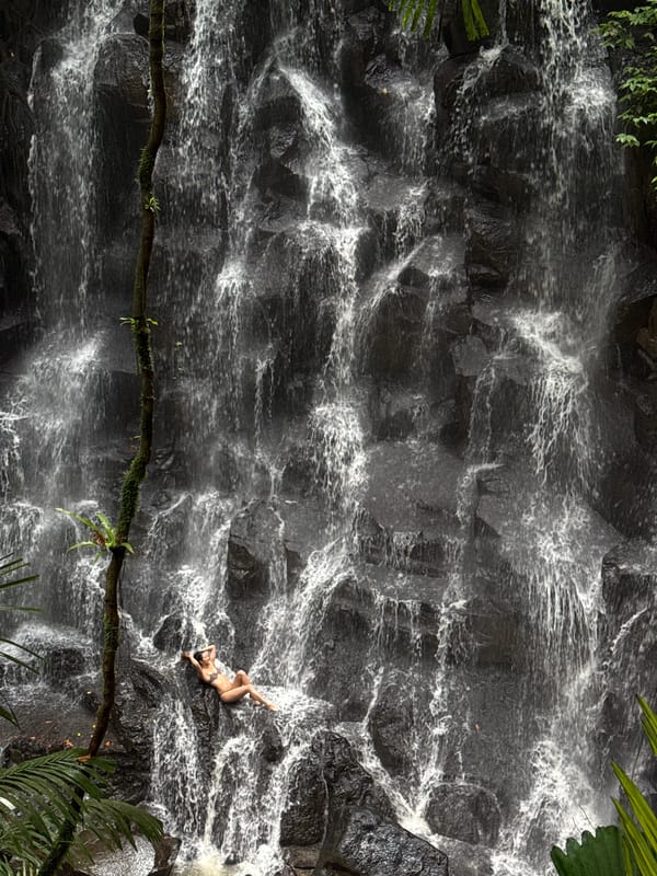 Couples enjoy intimate waterfall experience in Gianyar jungle setting