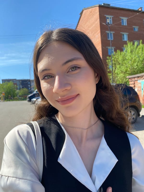 Woman takes morning selfies near lake in Votkinsk, Russia
