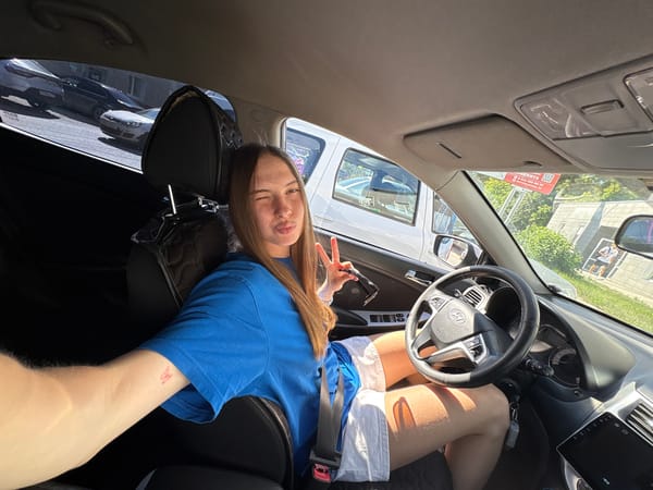 Car selfie session in Perm on a sunny June afternoon