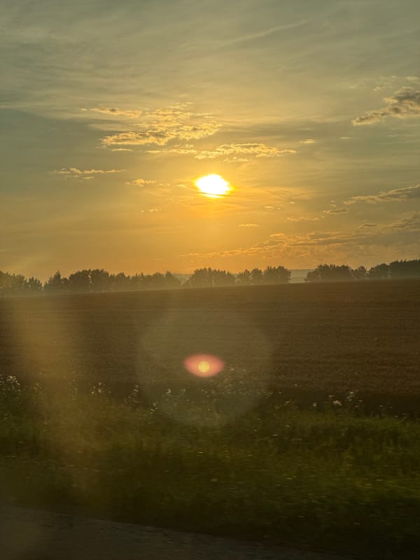Hazy rural sunset near the Urals, Russia
