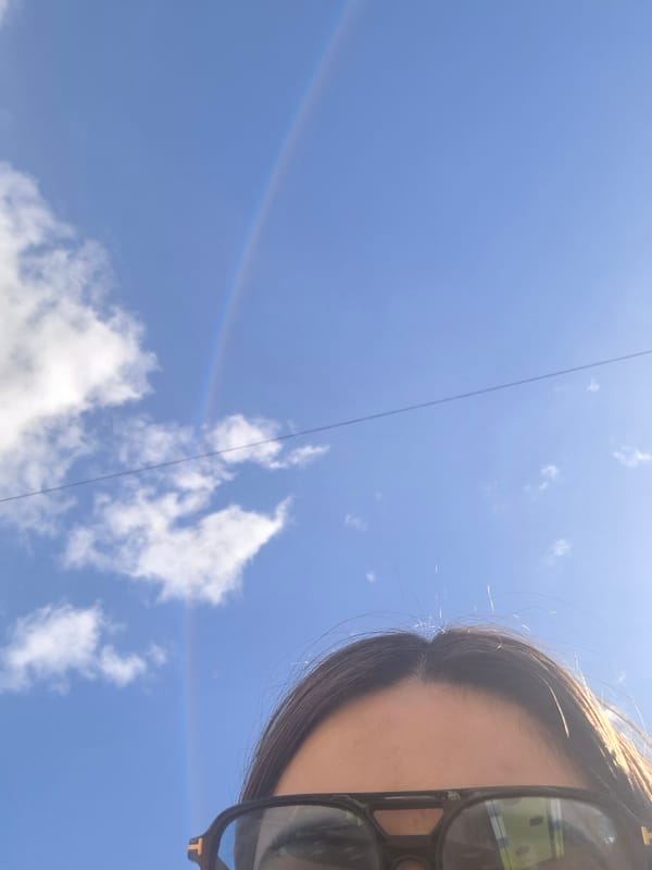 Playground moments captured in Chaikovsky during rainbow weather