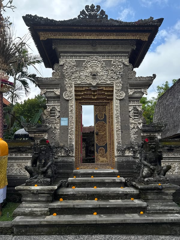 Temple statues, carvings, and street details across Ubud