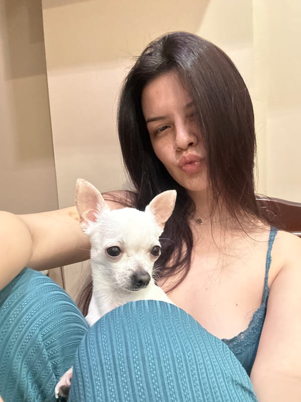 Woman takes playful selfies with white Chihuahua in Bulgaria