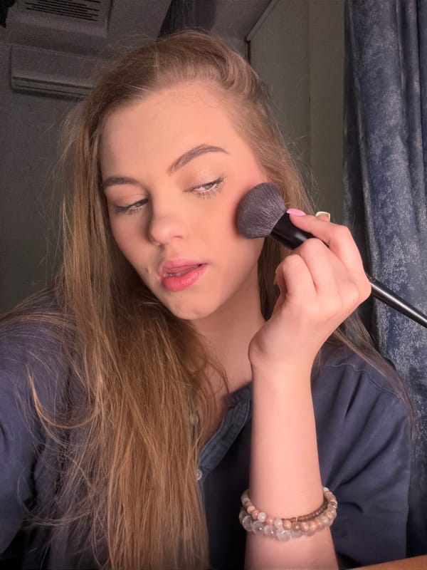 Makeup application caught from two angles, seconds apart.